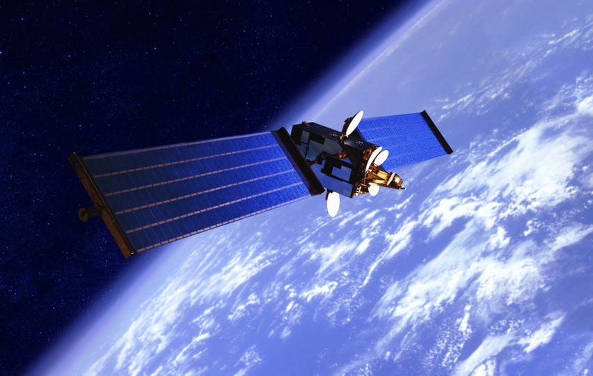 Image shows a communication satellite over the Earth.