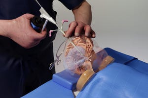 Benjamin Warf demonstrates a neurosurgery procedure