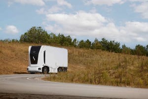 Swedish company Einride’s unmanned cabinless truck on a road.