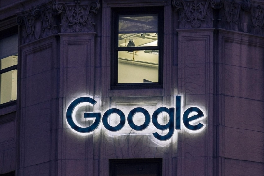 Illuminated Google logo on a building