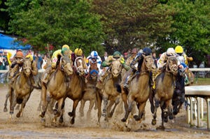 Image shows the Final Turn of the 2010 Kentucky Derby at Churchilll Downs in Louisville, Kentucky