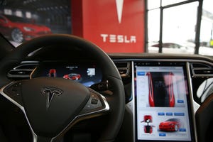 Image shows the inside of a Tesla vehicle