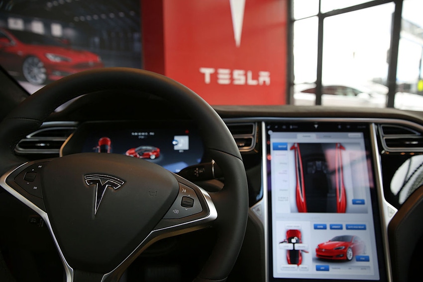 Image shows the inside of a Tesla vehicle