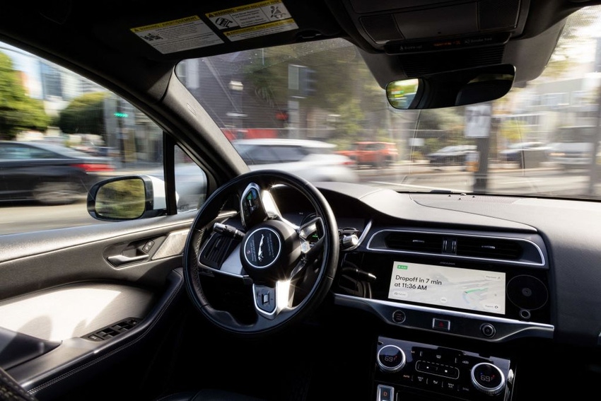 A Waymo autonomous vehicle turns onto Octavia Street from Oak Street in San Francisco, on Nov. 17, 2023.