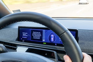 Image shows Ford’s BlueCruise driver-assistance tech on the dashboard of a vehicle.