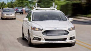 Ford Fusion Hybrid fitted with Velodyne LIDAR sensors.