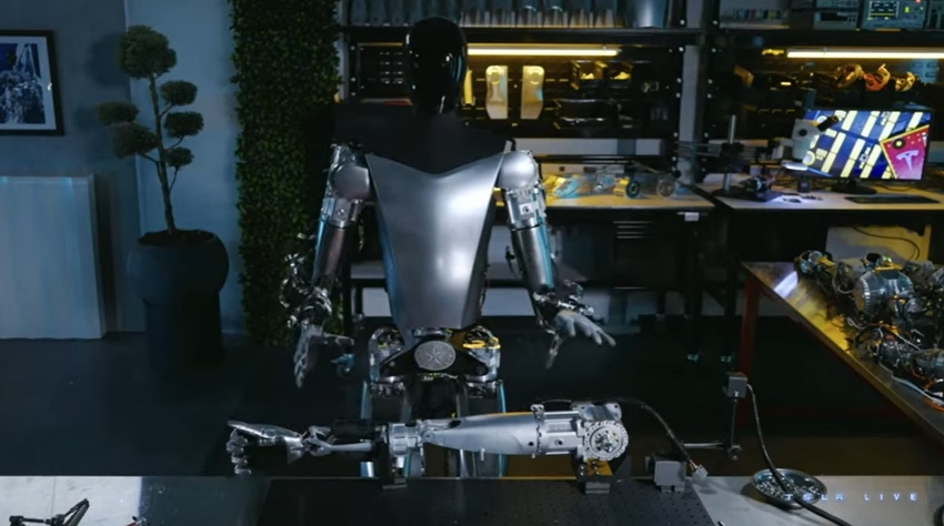 Image shows Tesla's Optimus robot working on another Optimus robot