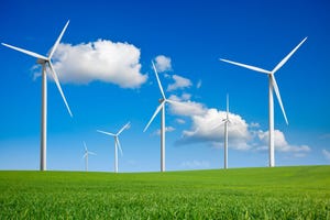 Image shows wind turbines in a field
