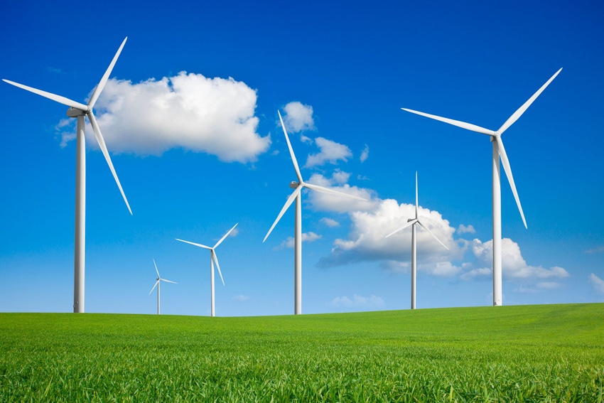 Image shows wind turbines in a field