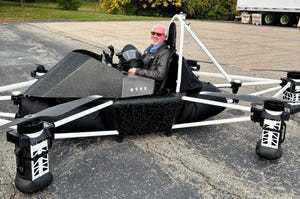 IoT World Today's editorial director Chuck Martin sits in a Ryse Aero Technologies; Ryse Recon electric aerial vehicles (EAV) before taking off.