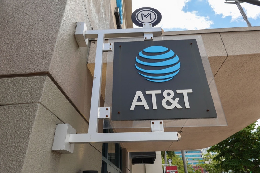 An AT&T sign hangs outside of a store on April 01, 2024, in Miami, Florida