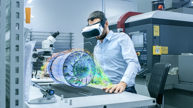 Factory Chief Engineer Wearing VR Headset Designs Engine Turbine on the Holographic Projection Table