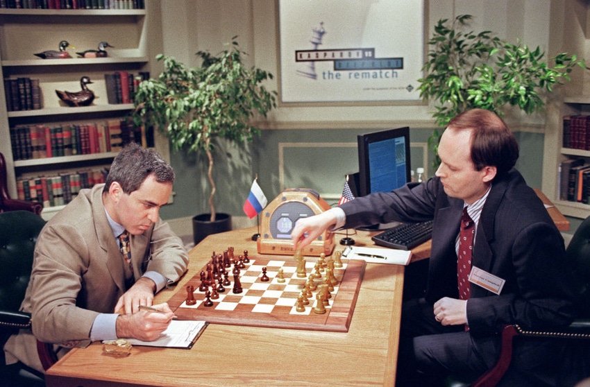 Image shows IBM scientist Murray Campbell (R) makes a move for the IBM Deep Blue computer in game May 4, 1997 in New York aga