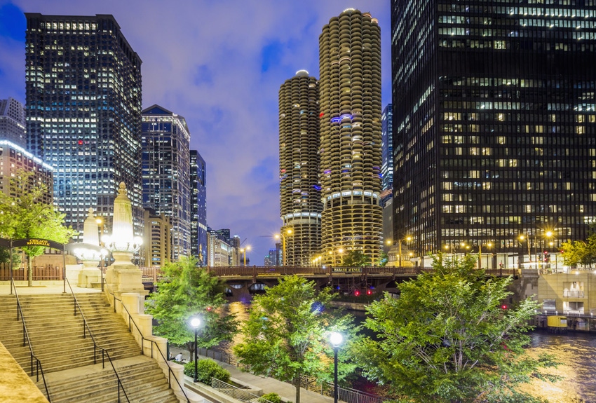 Image shows downtown, Near North, Chicago Riverwalk, Marina City skyscrapers on the background