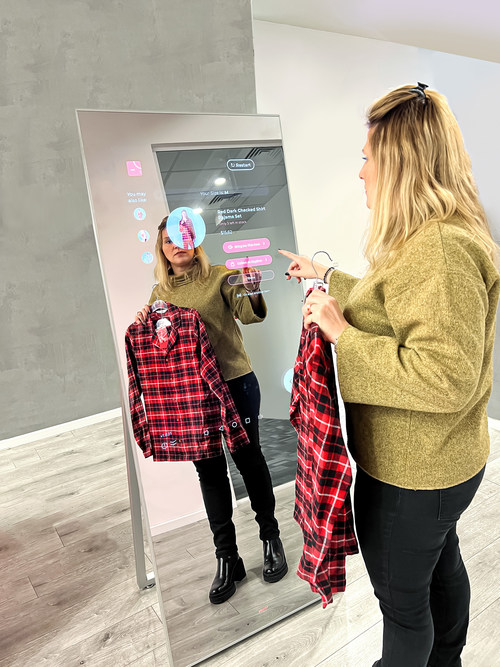 Proposed body scanner setup consisting of two mirrors, at least