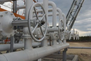 Valves on a pipe in a gas field. 