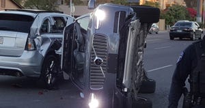Self-driving uber on its side after a wreck in Tempe, AZ