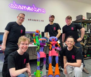 Andromeda Robotics team with Abi