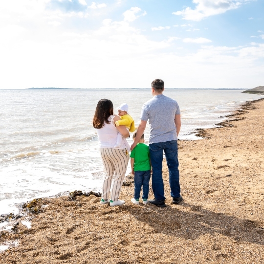 Family on a beach in Essex