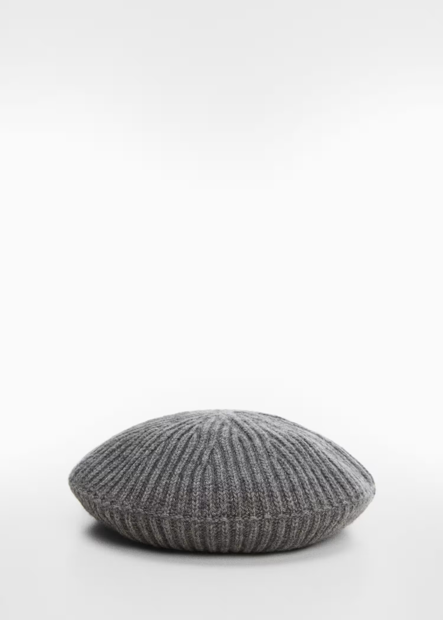 A grey women's beret in Parisian style.