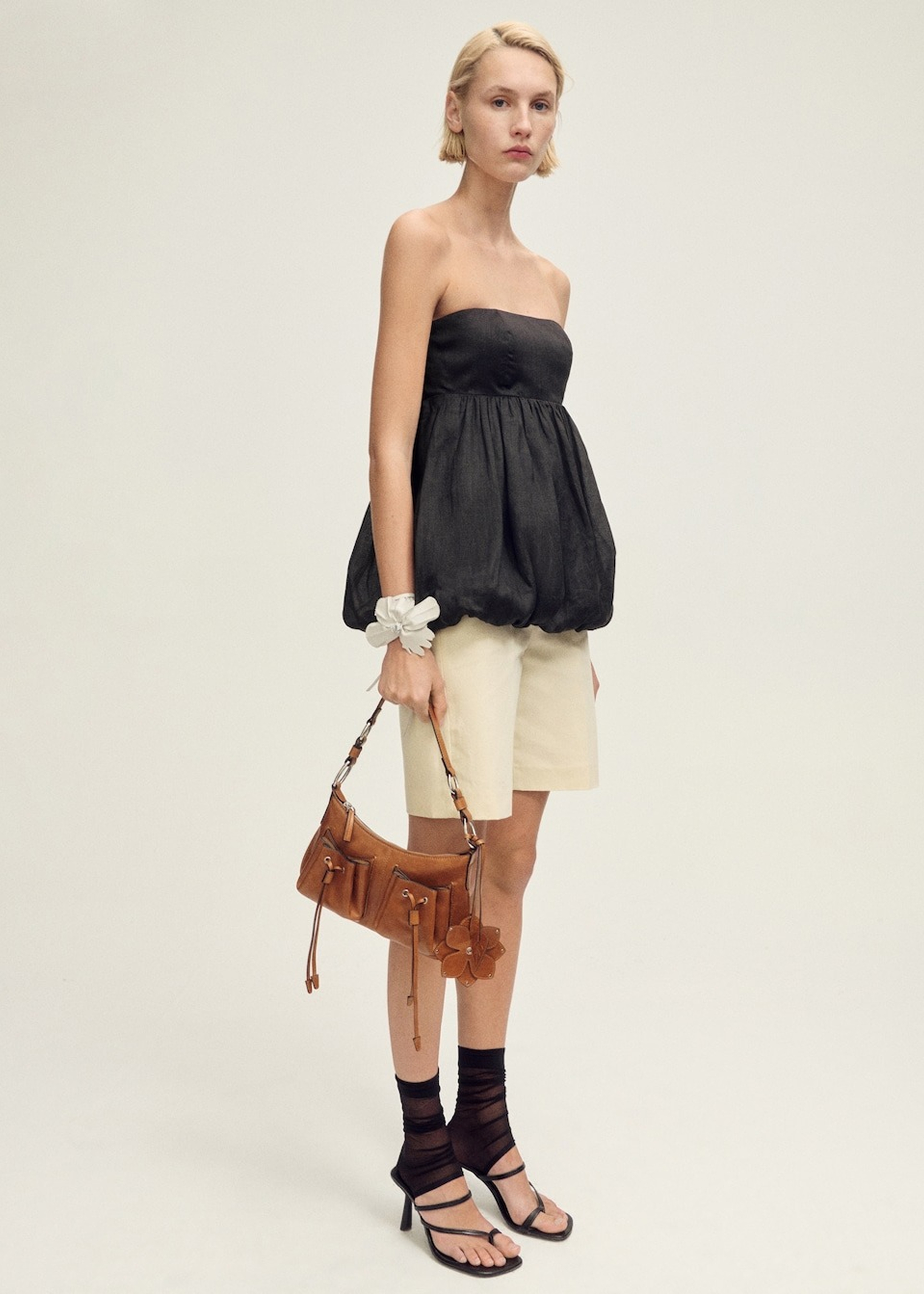 Look with capri-style Bermuda shorts.