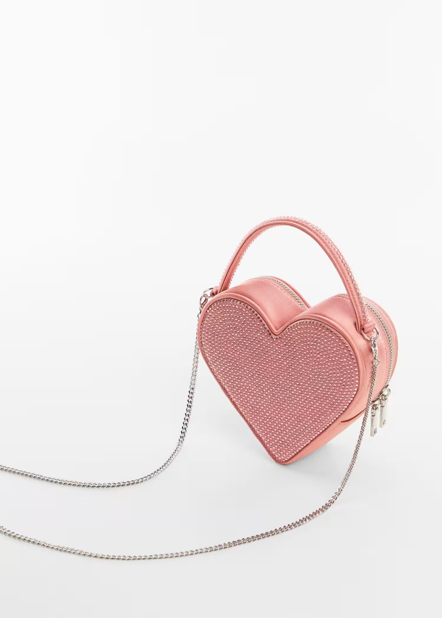 A pink heart-shaped bag.