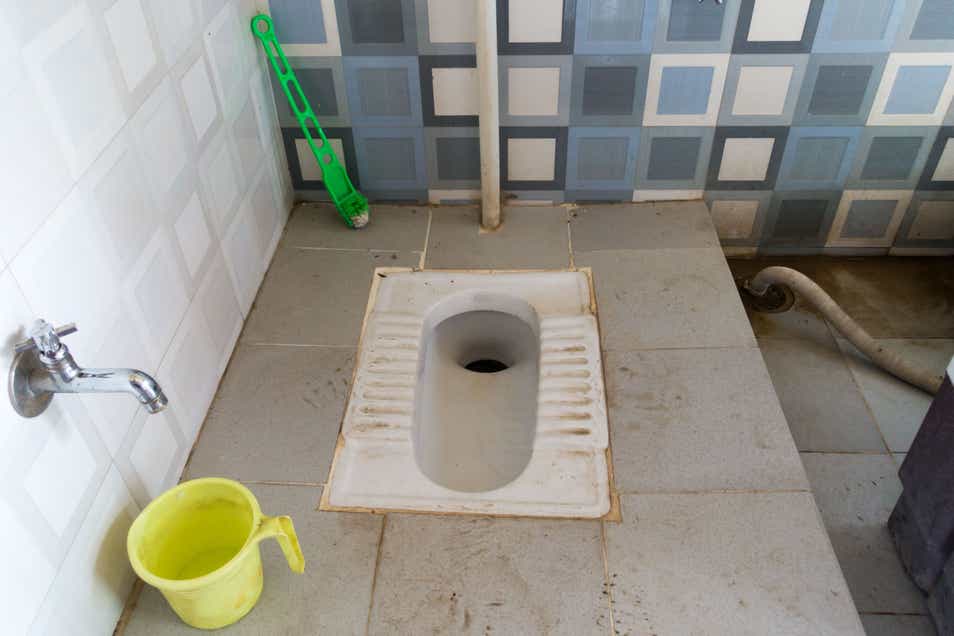 Dirty squat toilet