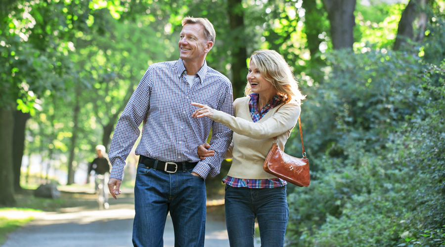 Couple walking through a holiday park
