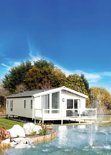 A holiday lodge at Oyster Bay holiday park in Cornwall