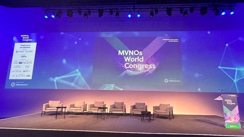 MVNOs World Congress 2024 stage with 6 grey chairs