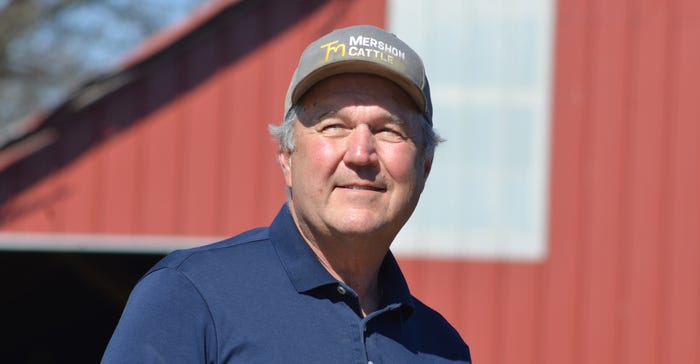 Bruce Mershon stands in front of the family barn at Mershon Cattle just outside of Buckner, Mo. 