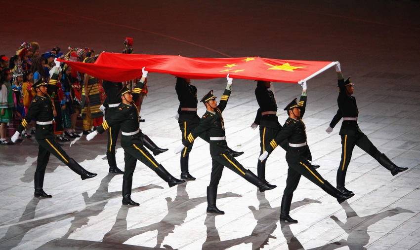 Chinese soldiers and flag