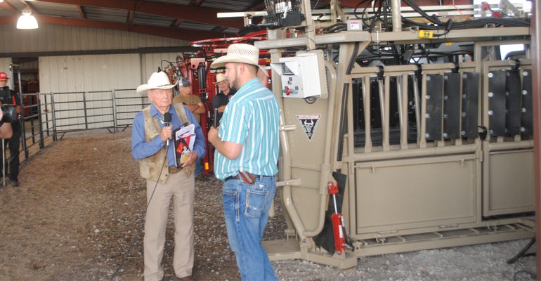 "Dr. Joe" Jeffrey interviews Austin Gubbels during the filming of live cattle handling demonstrations at HHD
