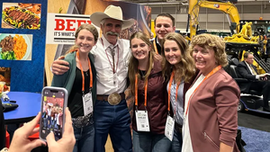 Actor Florrie J. Smith, “Lloyd Pierce” on the hit television series “Yellowstone,” poses with fans at the NCBA trade show