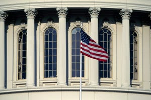 Capitol building with American flag