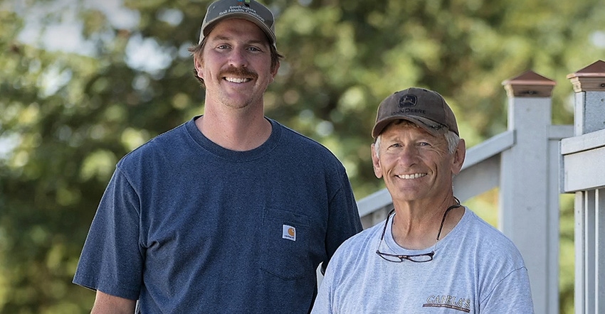 Jerry Moench and cattle producer Mike Blaalid