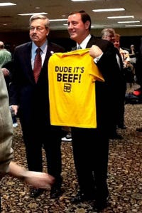 Iowa Gov. Terry Branstand and Kansas Gov. Sam Brownback with a "Dude, it's beef" t-shirt.