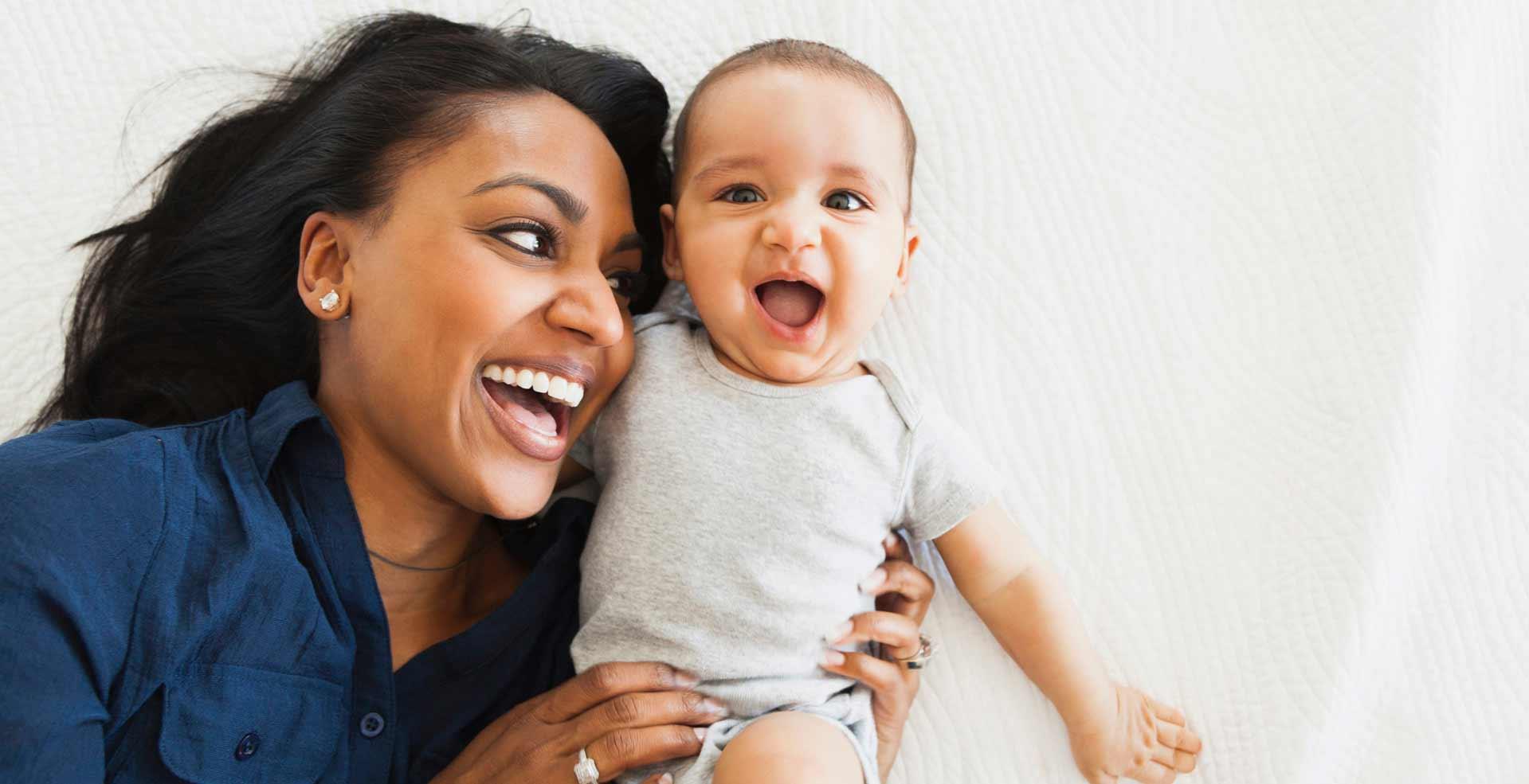 Smiling Mother and Baby