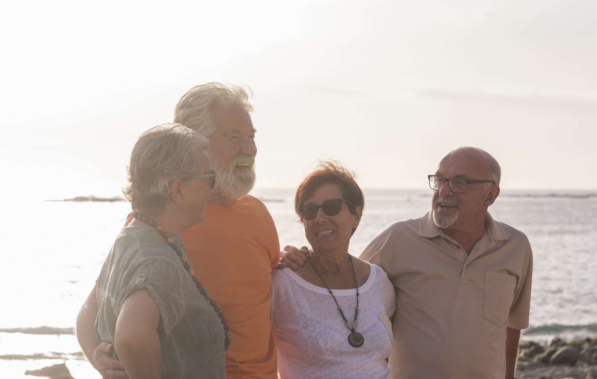group-of-seniors-at-the-beach-talking-together-and-2021-04-06-21-01-54-utc group-of-seniors-at-the-beach-talking-together-and-2021-04-06-21-01-54-utc