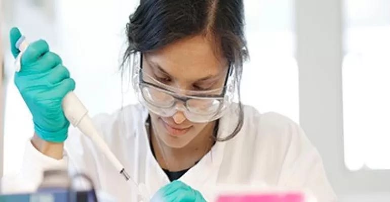 lady who's holding a medical testing device lady who's holding a medical testing device