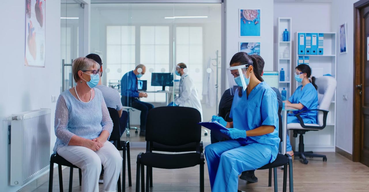 physician-and-patient-wearing-a-mask-and-maintaining-social-distancing.jpg physician-and-patient-wearing-a-mask-and-maintaining-social-distancing.jpg