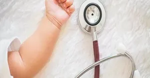 stethoscope besise a baby arm stethoscope besise a baby arm