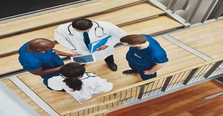 doctors talking to each other doctors talking to each other