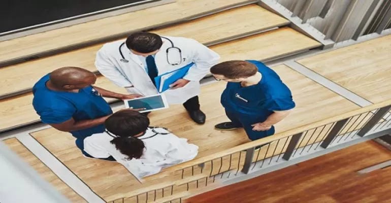 doctors talking to each other doctors talking to each other