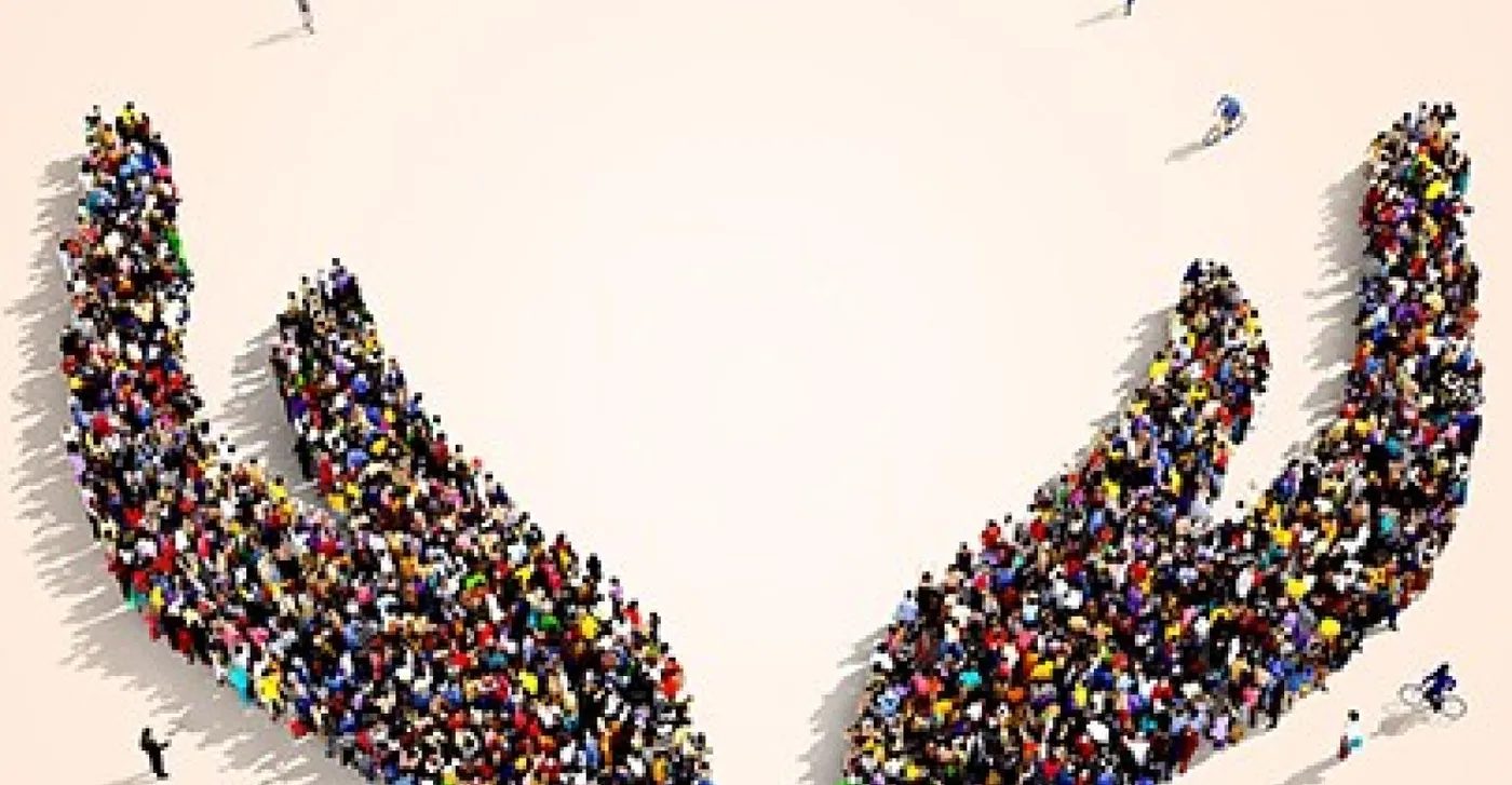 Crowd of people forming shape of of a hand Crowd of people forming shape of of a hand