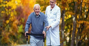 doctor guiding old person doctor guiding old person