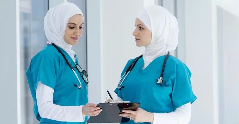two-middle-eastern-female-doctors-in-conversation.jpg two-middle-eastern-female-doctors-in-conversation.jpg