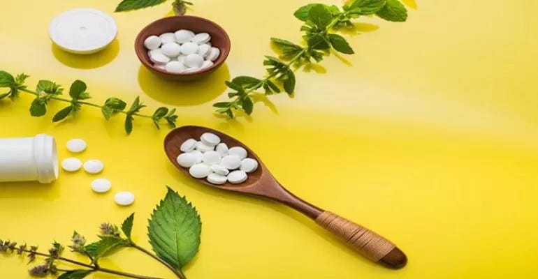 wood spoon filled with medicine wood spoon filled with medicine