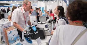 people talking in a trade hall people talking in a trade hall