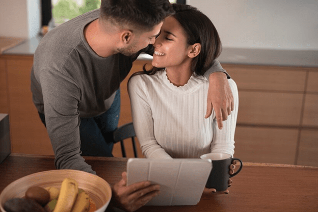 Couple sitting closely together